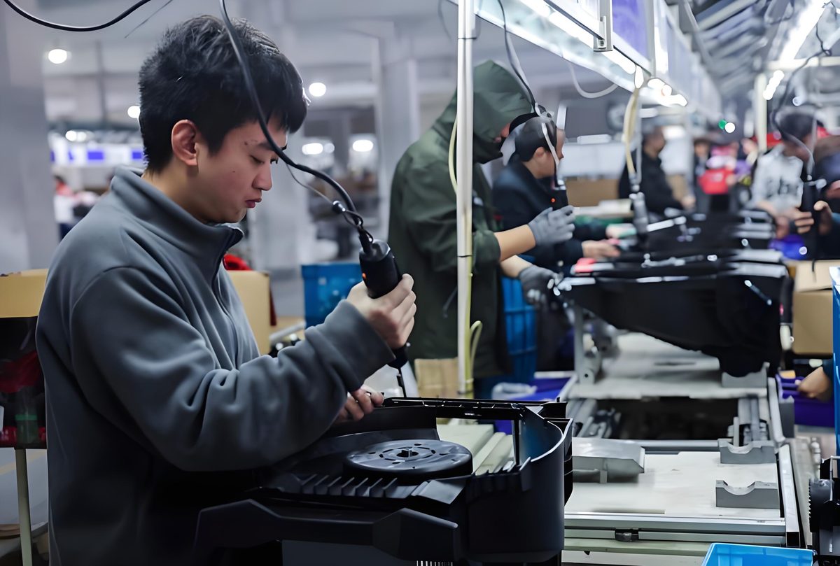 Complete product assembly with plastic, metal and electronic components